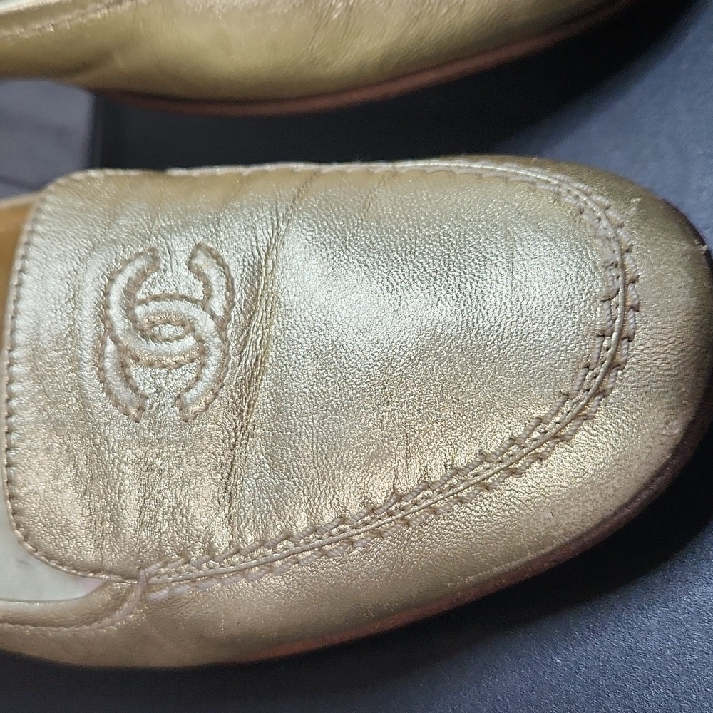 CHANEL Metallic Gold, Hard To Find , Flats With CC Logo On Front  Size 37.5 EU